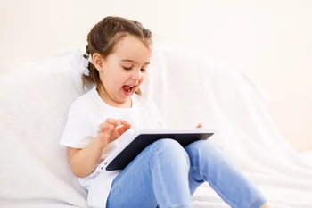 Happy child using a tablet